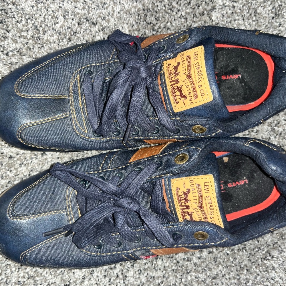 Men’s Levi’s blue denim w/leather & red tag;men’s  size 10.5, Maybe worn 1x!